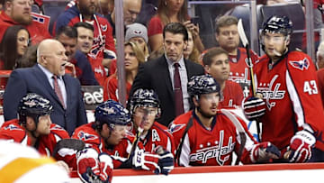 Apr 22, 2016; Washington, DC, USA; Washington Capitals head coach Barry Trotz (L) yells from the bench against the Philadelphia Flyers in the second period in game five of the first round of the 2016 Stanley Cup Playoffs at Verizon Center. The Flyers won 2-0, and the Capitals lead the series 3-2. Mandatory Credit: Geoff Burke-USA TODAY Sports
