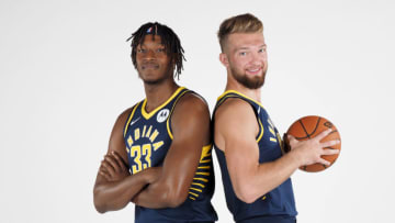 INDIANAPOLIS, IN - SEPTEMBER 27: Myles Turner #33 and Domantas Sabonis #11 of the Indiana Pacers pose for a portrait during media day on September 27, 2019 at Bankers Life Fieldhouse in Indianapolis, Indiana. NOTE TO USER: User expressly acknowledges and agrees that, by downloading and/or using this photograph, user is consenting to the terms and conditions of the Getty Images License Agreement. Mandatory Copyright Notice: Copyright 2019 NBAE (Photo by Ron Hoskins/NBAE via Getty Images)