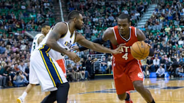 Jan 2, 2015; Salt Lake City, UT, USA; Atlanta Hawks forward Paul Millsap (4) tries to get past Utah Jazz forward Trevor Booker (33) and to the basket during the third quarter at EnergySolutions Arena. Atlanta Hawks won the game 98-92. Mandatory Credit: Chris Nicoll-USA TODAY Sports