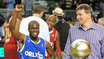 Feb 24, 2012; Orlando, FL, USA; Entertainer and comedian Kevin Hart reacts after winning the most valuable player award at the 2012 NBA All-Star Celebrity Game at the Orange County Convention Center. Mandatory Credit: Bob Donnan-USA TODAY Sports