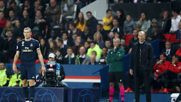 Real Madrid Manager Zinedine Zidane (right) with Real Madrid's Gareth Bale Paris Saint Germain v Real Madrid - UEFA Champions League - Group A - Parc des Princes 18-09-2019 . (Photo by Nick Potts/EMPICS/PA Images via Getty Images)