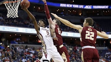 Mar 8, 2016; Washington, DC, USA; Florida State Seminoles guard Malik Beasley (5) shots the ball as Boston College Eagles forward Aser Ghebremichael (21) defends in the first half during round one of the ACC Conference tournament at Verizon Center. Mandatory Credit: Geoff Burke-USA TODAY Sports