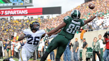 Oct 29, 2016; East Lansing, MI, USA; Michigan State Spartans wide receiver Monty Madaris (88) attempts to make a catch over Michigan Wolverines cornerback Jourdan Lewis (26) during the second half of a game at Spartan Stadium. Mandatory Credit: Mike Carter-USA TODAY Sports
