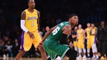 LOS ANGELES, CA - JANUARY 23: Marcus Smart #36 of the Boston Celtics watches his last shot of the game miss in front of Kentavious Caldwell-Pope #1 of the Los Angeles Lakers to lose 108-107 to the Los Angeles Lakers at Staples Center on January 23, 2018 in Los Angeles, California. (Photo by Harry How/Getty Images)
