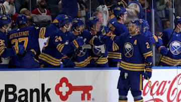 Oct 14, 2021; Buffalo, New York, USA; Buffalo Sabres center Zemgus Girgensons (28) celebrates his goal with teammates during the first period against the Montreal Canadiens at KeyBank Center. Mandatory Credit: Timothy T. Ludwig-USA TODAY Sports