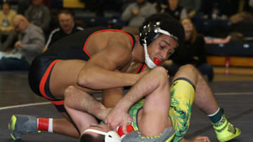 Dec 30, 2016; Pittsburgh, PA, USA; CamCoy (green) wrestles Carter Starocci (black) in the 152 lb. class at the Powerade Junior Wrestling Tournament at Canon McMillan High School. Mandatory Credit: Charles LeClaire-USA TODAY Sports