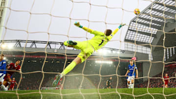 LIVERPOOL, ENGLAND - DECEMBER 10: Jordan Pickford of Everton dives, as Mohamed Salah of Liverpool (not pictured) scores his side's first goal during the Premier League match between Liverpool and Everton at Anfield on December 10, 2017 in Liverpool, England. (Photo by Clive Brunskill/Getty Images)