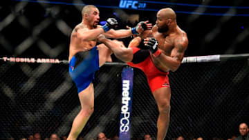 LAS VEGAS, NV - JULY 08: (L-R) Robert Whittaker of New Zealand and Yoel Romero of Cuba exchange kicks in their interim UFC middleweight championship bout during the UFC 213 event at the T-Mobile Arena on July 8, 2017 in Las Vegas, Nevada. (Photo by Jeff Bottari/Zuffa LLC/Zuffa LLC via Getty Images)