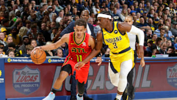 INDIANAPOLIS, IN - NOVEMBER 29: Trae Young #11 of the Atlanta Hawks handles the ball against the Indiana Pacers on November 29, 2019 at Bankers Life Fieldhouse in Indianapolis, Indiana. NOTE TO USER: User expressly acknowledges and agrees that, by downloading and or using this Photograph, user is consenting to the terms and conditions of the Getty Images License Agreement. Mandatory Copyright Notice: Copyright 2019 NBAE (Photo by Ron Hoskins/NBAE via Getty Images)