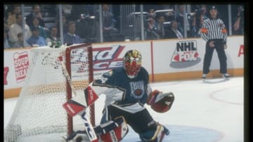 Goaltender John Vanbiesbrouck blocks a shot during the NHL All-Star game. Credit: Rick Stewart /Allsport