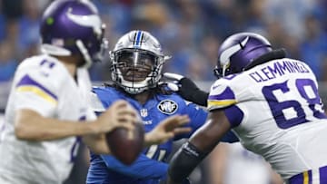 Nov 24, 2016; Detroit, MI, USA; Detroit Lions defensive end Ezekiel Ansah (94) works against Minnesota Vikings offensive tackle T.J. Clemmings (68) as he pressures quarterback Sam Bradford (8) during the fourth quarter at Ford Field. Lions win 16-13. Mandatory Credit: Raj Mehta-USA TODAY Sports