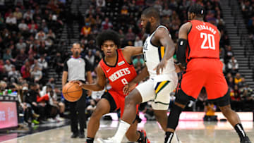 SALT LAKE CITY, UTAH - FEBRUARY 14: Josh Christopher #9 of the Houston Rockets drives against Eric Paschall #0 of the Utah Jazz during the second half of a game at Vivint Smart Home Arena on February 14, 2022 in Salt Lake City, Utah. NOTE TO USER: User expressly acknowledges and agrees that, by downloading and or using this photograph, User is consenting to the terms and conditions of the Getty Images License Agreement. (Photo by Alex Goodlett/Getty Images)