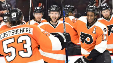 Apr 20, 2016; Philadelphia, PA, USA; Philadelphia Flyers defenseman Andrew MacDonald (47) celebrates with defenseman Shayne Gostisbehere (53) and right wing Wayne Simmonds (17) after scoring a goal against the Washington Capitals during the second period in game four of the first round of the 2016 Stanley Cup Playoffs at Wells Fargo Center. Mandatory Credit: Eric Hartline-USA TODAY Sports