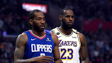 LOS ANGELES, CALIFORNIA - MARCH 08: Kawhi Leonard #2 of the LA Clipper and LeBron James #23 of the Los Angeles Lakers during the first half at Staples Center on March 08, 2020 in Los Angeles, California. NOTE TO USER: User expressly acknowledges and agrees that, by downloading and or using this photograph, User is consenting to the terms and conditions of the Getty Images License Agreement. (Photo by Harry How/Getty Images)