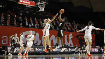 CORVALLIS, OREGON - DECEMBER 06: Mya Hollingshed #21 of the Colorado Buffaloes shoots the ball over Taylor Jones #44 of the Oregon State Beavers at Gill Coliseum on December 06, 2020 in Corvallis, Oregon. (Photo by Soobum Im/Getty Images)
