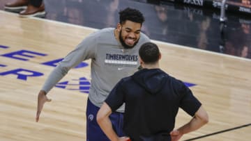 Minnesota Timberwolves center Karl-Anthony Towns chats with Chicago Bulls guard Zach LaVine. Mandatory Credit: Kamil Krzaczynski-USA TODAY Sports