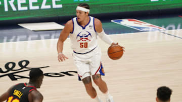 Mar 28, 2021; Denver, Colorado, USA; Denver Nuggets forward Aaron Gordon (50) controls the ball against the Atlanta Hawks in the first quarter at Ball Arena. Mandatory Credit: Ron Chenoy-USA TODAY Sports