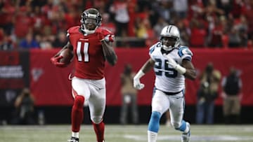 Oct 2, 2016; Atlanta, GA, USA; Atlanta Falcons wide receiver Julio Jones (11) runs for a touchdown against Carolina Panthers cornerback Bene