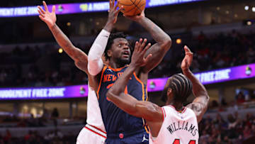 CHICAGO, ILLINOIS - DECEMBER 14: Julius Randle #30 of the New York Knicks is fouled on a shot by Patrick Williams #44 of the Chicago Bulls during the first half at United Center on December 14, 2022 in Chicago, Illinois. NOTE TO USER: User expressly acknowledges and agrees that, by downloading and or using this photograph, User is consenting to the terms and conditions of the Getty Images License Agreement. (Photo by Michael Reaves/Getty Images)