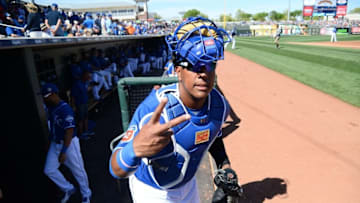Mar 13, 2016; Surprise, AZ, USA; Kansas City Royals catcher Salvador Perez (13) leaves the dugout during the fourth inning against the Cleveland Indians at Surprise Stadium. Mandatory Credit: Joe Camporeale-USA TODAY Sports