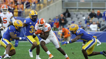 Oct 23, 2021; Pittsburgh, Pennsylvania, USA; Clemson Tigers running back Kobe Pace (20) carries the ball against the Pittsburgh Panthers during the first quarter at Heinz Field. Mandatory Credit: Charles LeClaire-USA TODAY Sports