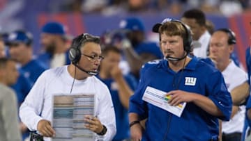 Aug 12, 2016; East Rutherford, NJ, USA; New York Giants offensive coordinator Mike Sullivan and New York Giants Head Coach Ben McAdoo talking in the first half at MetLife Stadium. Mandatory Credit: William Hauser-USA TODAY Sports
