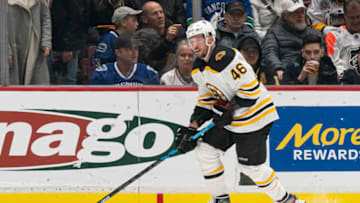 VANCOUVER, BC - FEBRUARY 22: David Krejci #46 of the Boston Bruins skates with the puck during NHL action against the Vancouver Canucks at Rogers Arena on February 22, 2020 in Vancouver, Canada. (Photo by Rich Lam/Getty Images)