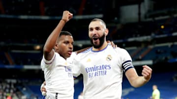 MADRID, SPAIN - SEPTEMBER 22: Karim Benzema (R) of Real Madrid CF celebrates scoring what would have been their fourth goal with teammate Rodrygo Goes (L) but the goal was then disallowed during the La Liga Santander match between Real Madrid CF and RCD Mallorca at Estadio Santiago Bernabeu on September 22, 2021 in Madrid, Spain. (Photo by Gonzalo Arroyo Moreno/Getty Images)