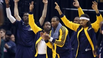 Apr 22, 2014; Indianapolis, IN, USA; Indiana Pacers bench reacts after Pacers made a three point shot against the Atlanta Hawks in game two during the first round of the 2014 NBA Playoffs at Bankers Life Fieldhouse. Mandatory Credit: Brian Spurlock-USA TODAY Sports