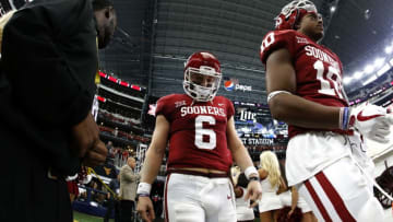 ARLINGTON, TX - DECEMBER 2: Baker Mayfield #6 of the Oklahoma Sooners takes the field with teammates before playing the TCU Horned Frogs during the first half at AT&T Stadium on December 2, 2017 in Arlington, Texas. OU won 41-17. (Photo by Ron Jenkins/Getty Images)