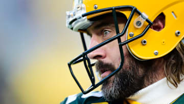 GREEN BAY, WISCONSIN - NOVEMBER 28: Aaron Rodgers #12 of the Green Bay Packers looks on during pregame warm-ups before the game against the Los Angeles Rams at Lambeau Field on November 28, 2021 in Green Bay, Wisconsin. (Photo by Patrick McDermott/Getty Images)