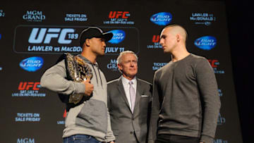 CALGARY, AB - MARCH 25: Robbie Lawler (L) faces off against Rory MacDonald (R) during the UFC 189 World Championship Press Tour at Flames Central on March 25, 2015 in Calgary, Alberta, Canada. (Photo by Derek Leung/Getty Images)