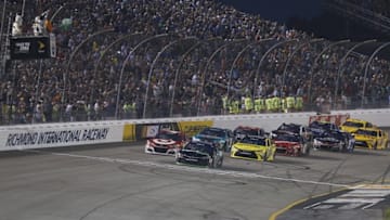Sep 10, 2016; Richmond, VA, USA; Sprint Cup Series driver Denny Hamlin (11) crosses over the start line during the Federated Auto Parts 400 at Richmond International Raceway. Mandatory Credit: Amber Searls-USA TODAY Sports