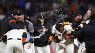 SAN FRANCISCO, CA - JULY 09: Pablo Sandoval #48 of the San Francisco Giants is congratulated by teammates after hitting the game-winning hit in the bottom of the 11th inning against the Chicago Cubs at AT&T Park on July 9, 2018 in San Francisco, California. (Photo by Ezra Shaw/Getty Images)