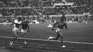 Wilma Rudolph breaks the tape as she wins the Olympic 4 x 100 relay in 1960.