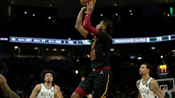 MILWAUKEE, WISCONSIN - DECEMBER 18: Darius Garland #10 of the Cleveland Cavaliers makes a running jump shot during the second half of the game against the Milwaukee Bucks at Fiserv Forum on December 18, 2021 in Milwaukee, Wisconsin. NOTE TO USER: User expressly acknowledges and agrees that, by downloading and or using this photograph, User is consenting to the terms and conditions of the Getty Images License Agreement. (Photo by John Fisher/Getty Images)