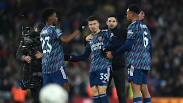 LIVERPOOL, ENGLAND - JANUARY 13: Mikel Arteta of Arsenal congratulates his players after the final whistle looks on during the Carabao Cup Semi Final First Leg match between Liverpool and Arsenal at Anfield on January 13, 2022 in Liverpool, England. (Photo by Michael Regan/Getty Images)