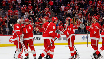 Oct 22, 2023; Detroit, Michigan, USA; Detroit Red Wings celebrate after defeating the Calgary Flames at Little Caesars Arena. Mandatory Credit: Rick Osentoski-USA TODAY Sports