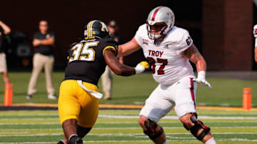 Auburn footballSep 17, 2022; Boone, North Carolina, USA; Troy Trojans offensive lineman Grant Betts (67) blocks Appalachian State Mountaineers linebacker Jalen McLeod (35) during the first quarter at Kidd Brewer Stadium. Mandatory Credit: Reinhold Matay-USA TODAY Sports