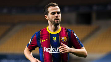 SEVILLE, SPAIN - JANUARY 17: Miralem Pjanic of FC Barcelona looks on during the Supercopa de Espana Final match between FC Barcelona and Athletic Club at Estadio de La Cartuja on January 17, 2021 in Seville, Spain. Sporting stadiums around Spain remain under strict restrictions due to the Coronavirus Pandemic as Government social distancing laws prohibit fans inside venues resulting in games being played behind closed doors. (Photo by David Ramos/Getty Images)