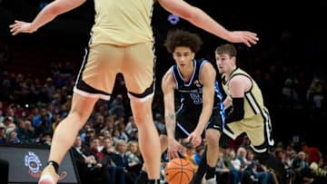 Nov 27, 2022; Portland, Oregon, USA; Duke Blue Devils guard Tyrese Proctor (5) dribbles during the second half against Purdue Boilermakers center Zach Edey (15) at Moda Center. Purdue won the Phil Knight Legacy Championship game 75-56. Mandatory Credit: Troy Wayrynen-USA TODAY Sports