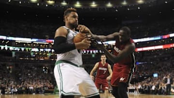 Feb 27, 2016; Boston, MA, USA; Boston Celtics center Jared Sullinger (7) battles for possession with Miami Heat forward Luol Deng (9) during the second half at TD Garden. Mandatory Credit: Bob DeChiara-USA TODAY Sports