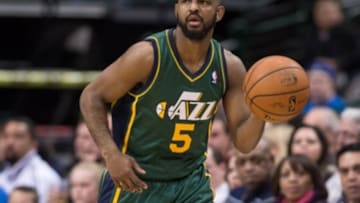 Feb 7, 2014; Dallas, TX, USA; Utah Jazz point guard John Lucas III (5) brings the ball up court during the game at the American Airlines Center. The Mavericks defeated the Jazz 103-81. Mandatory Credit: Jerome Miron-USA TODAY Sports
