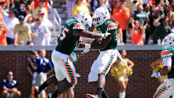 ATLANTA, GA - OCTOBER 01: Shaquille Quarterman #55 of the Miami Hurricanes celebrates recovering a fumble for a touchdown during the first half against the Georgia Tech Yellow Jackets at Bobby Dodd Stadium on October 1, 2016 in Atlanta, Georgia. (Photo by Daniel Shirey/Getty Images)