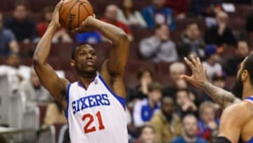 Mar 21, 2014; Philadelphia, PA, USA; Philadelphia 76ers forward Thaddeus Young (21) shoots a jump shot during the first quarter against the New York Knicks at the Wells Fargo Center. Mandatory Credit: Howard Smith-USA TODAY Sports