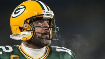 GREEN BAY, WISCONSIN - DECEMBER 19: Aaron Rodgers #12 of the Green Bay Packers warms up prior to playing the Los Angeles Rams at Lambeau Field on December 19, 2022 in Green Bay, Wisconsin. (Photo by Patrick McDermott/Getty Images)