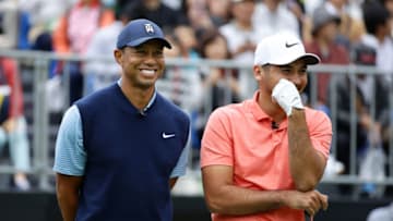 INZAI, JAPAN - OCTOBER 21: Tiger Woods of the United States and Jason Day of Australia share a laugh on the first tee during The Challenge: Japan Skins at Accordia Golf Narashino Country Club on October 21, 2019 in Inzai, Chiba, Japan. (Photo by Richard Heathcote/Getty Images)