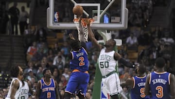 Oct 19, 2016; Boston, MA, USA; New York Knicks forward Maurice Daly Ndour (2) lays the ball past the reach of Boston Celtics forward Ben Bentil (50) during the second half at TD Garden. Mandatory Credit: Bob DeChiara-USA TODAY Sports