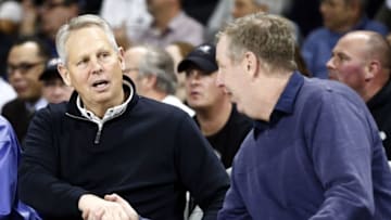 Jan 5, 2016; Providence, RI, USA; Boston Celtics president of basketball operations Danny Ainge (left) speaks to fans during the first half of a game between the Providence Friars and the Marquette Golden Eagles at Dunkin Donuts Center. Mandatory Credit: Mark L. Baer-USA TODAY Sports
