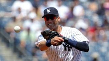 Jul 2, 2014; Bronx, NY, USA; New York Yankees shortstop Derek Jeter (2) is unable to throw out Tampa Bay Rays center fielder Desmond Jennings (8) (not pictured) during the first inning at Yankee Stadium. Mandatory Credit: Adam Hunger-USA TODAY Sports
